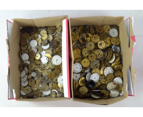 A large collection of pocket watch movements and dials, also fob movements and dials, component parts, etc.&nbsp;