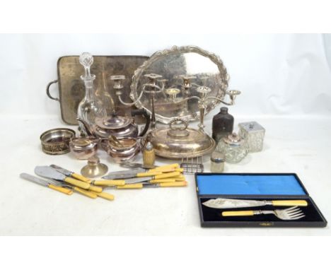 A small group of electroplated items to include an entree dish, a pair of bottle coasters, a small toast rack and a hip flask