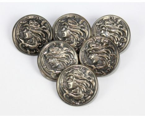 ABLE &amp; CHARNELL; a cased matched set of six Edward VII hallmarked silver Art Nouveau buttons, each centred with repoussé 
