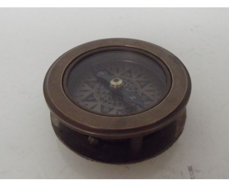 Compass/magnifying glass 