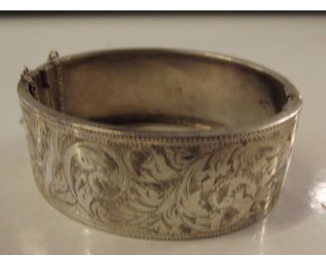 Silver bangle with engraved decoration, Walker & Hal