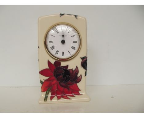 Moorcroft clock in the Ruby Red pattern, height 16cm