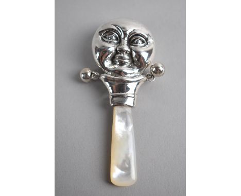 A Sterling Silver and Mother of Pearl Handled Babies Teether Rattle, The Moon, 8cm Long 