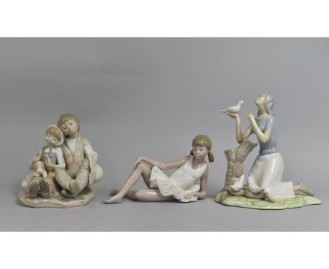 Three Spanish Ornaments, to Include Nao Ballerina and Lladro Figure Group 