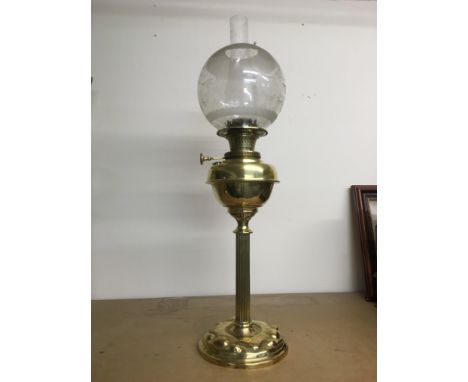 An Art Nouveau brass oil lamp with etched glass shade, approx height 72cm.