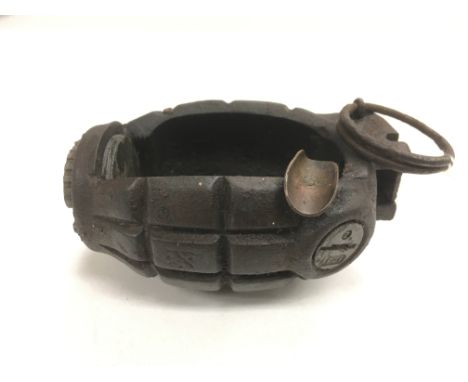 An inert WW2 trench art No 36 Mills grenade ashtray.
