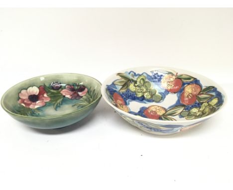 A Moorcroft bowl and a Studio art pottery bowl decorated with fruit and foliage. No obvious damage Moorcroft bowl diameter 21