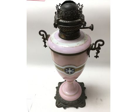 A Victorian pink and opaque glass oil lamp.