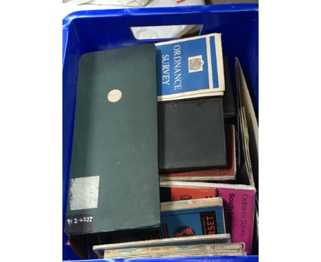 A box containing a large quantity of vintage maps.