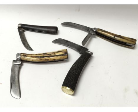 Four early vintage pocket knives, two with stag handles engraved with George Butler and the other engraved with Wingfield. Th