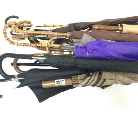 A collection of vintage ladies parasols and umbrellas (22)