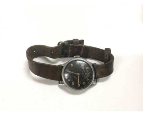 A WW2 German 'Helma' DH army issue automatic watch on original leather strap. Back stamped D06578H. Believed to have been bro