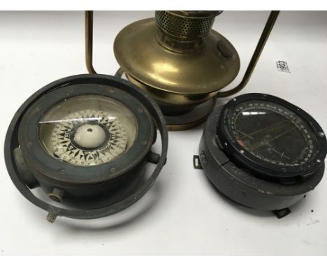 Two Military type compass on e in a gimbal pattern 184M and a Type P8 and a hanging brass oil lamp with glass shade (3) - NO 