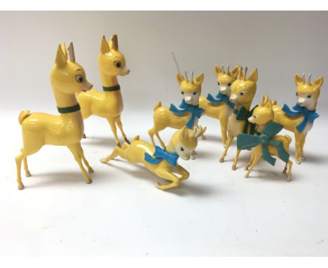 Eight vintage Babycham 1950s/1960s plastic deer.