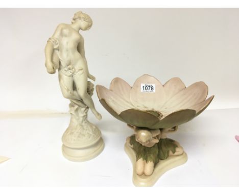 A Royal Dux porcelain Art Deco table centrepiece in the form of Lilly pad supported by female figures and a neoclassical Pari