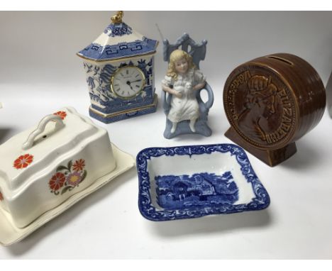 A Collection of ceramics including a Wedgwood blue willow clock with certificate, a shredded wheat dish, a money bank. Also, 