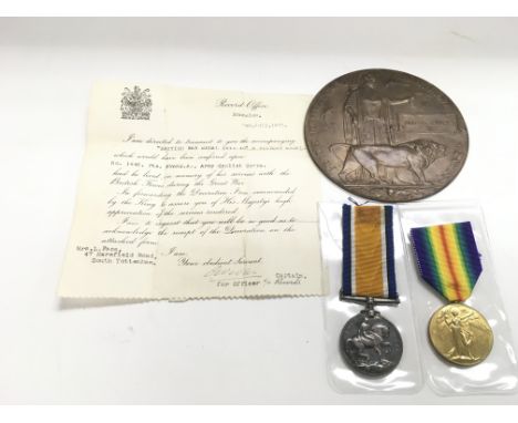 A WW1 memorial plaque and medal duo in memorium of 1446 Pte A Evans of 8th Division of the army cyclist corps. Died Aubers Ri