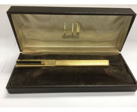 A vintage boxed Dunhill rectangular fountain pen with an 18ct gold nib.
