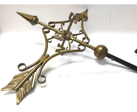 Small wall mounted weather vane