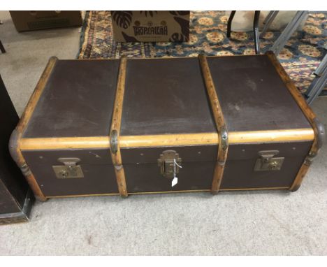 A wooden bound travelling trunk, approx 90cm x 51cm - NO RESERVE