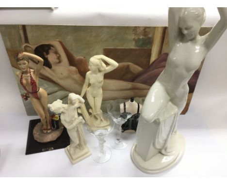 A blanc de chine figural table lamp of a female nude, two female alabaster figures of ladies, a pair of drinking glasses, 198