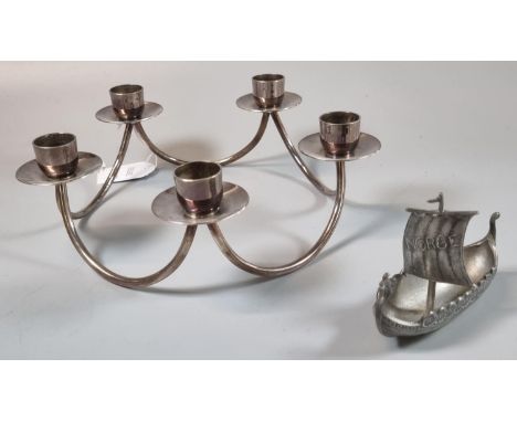 A Berg of Denmark five branch silver plated candlestick, together with a pewter miniature model of a Norwegian viking ship ma