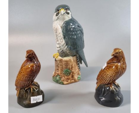 Royal Doulton Whyte & Mackay Scotch whisky Peregrine Falcon decanter, appearing to have some liquid inside it. Together with 