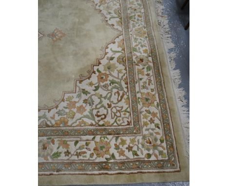 Large cream ground Middle Eastern design floral and foliate carpet.  367x280cm approx.  (B.P. 21% + VAT) 