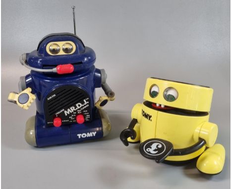 Vintage Tomy automatic bank robot 'Mr Money', together with a Tomy alarm clock in the form of  'Mr.D.J. Robot'. (2)(B.P. 21% 