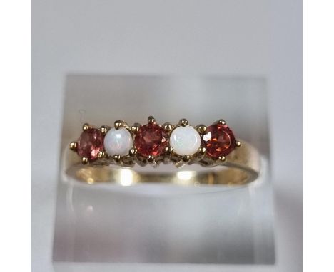 9ct gold red stone and opal dress ring.  3.1g approx.  Size Q.  (B.P. 21% + VAT) 