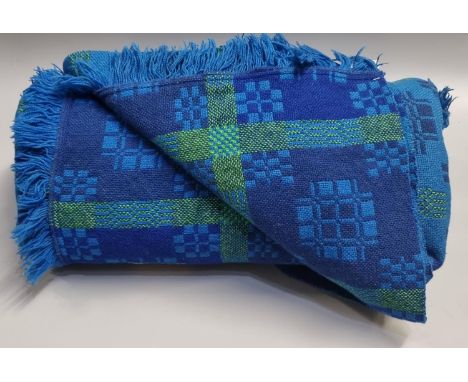 Blue ground Welsh tapestry woollen fringed edge blanket or carthen with geometric pattern and 'Meirion Mill Ltd, pure new woo