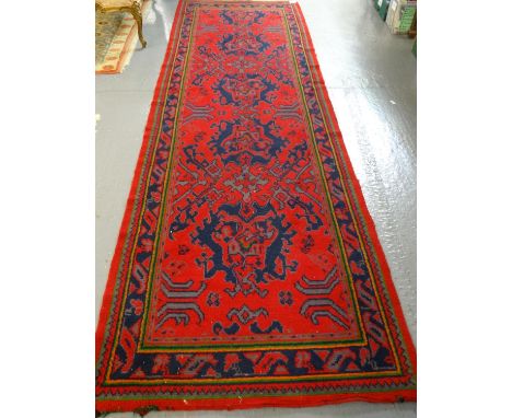 Vintage red ground Iranian runner with geometric and foliate decoration. (B.P. 21% + VAT)  Dimensions: L362xW122cm approx.   