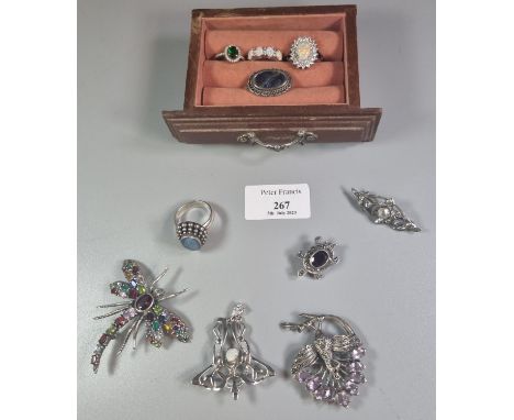 Collection of silver and white metal jewellery to include: peacock and dragonfly brooch, opal dress rings, Art Nouveau design