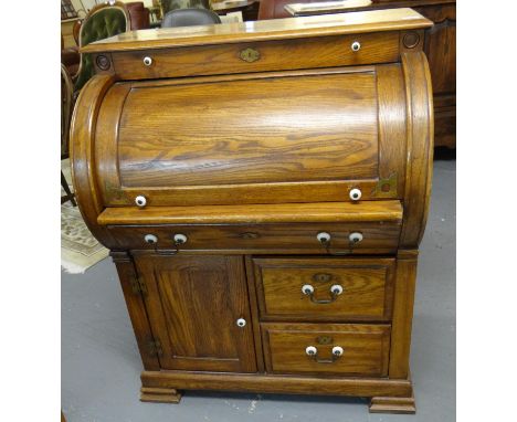 20th Century oak cylinder bureau with metal swan neck and ceramic handles. (B.P. 21% + VAT)