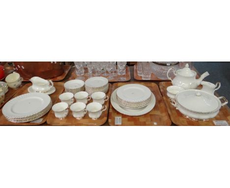 Four trays of Royal Albert English bone china 'Val D'or' design dinner and teaware to include: various plates, sauce boat and