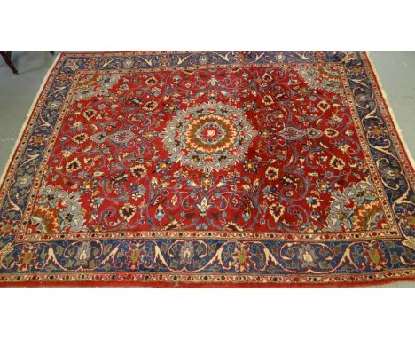 Persian design red ground floral and foliate carpet. (B.P. 21% + VAT)  Dimensions: W145xL199cm approx.