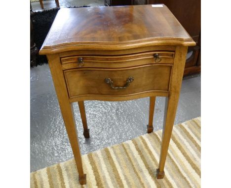 Reproduction mahogany serpentine design single drawer lamp table on tapering legs and spade feet.  (B.P. 21% + VAT) 