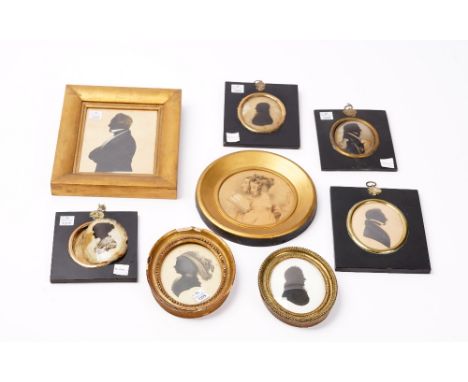 A group of 19th century portrait miniature silhouettes and a drawing of two young ladies, within ebonised and gilt frames (8)