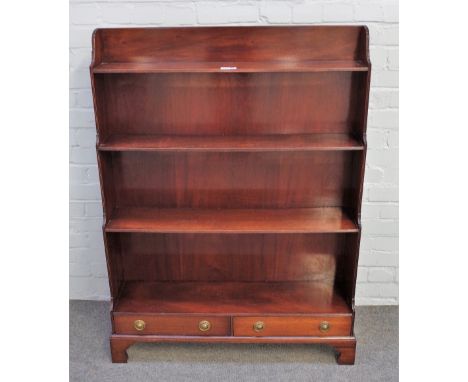 A George III style mahogany floor standing four tier waterfall bookcase on bracket feet, 90cm wide x 123cm high.
