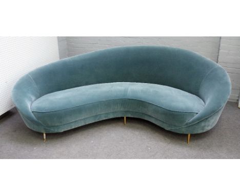 Retro design; a modern curved sofa, on six tapering gilt metal supports, 245cm wide x 82cm high. Condition Report There are n