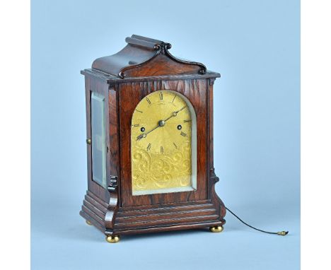 A Fine Late Regency rosewood mantel clockBy Santiago James Moore French, Royal Exchange, London The case with a swept pedimen
