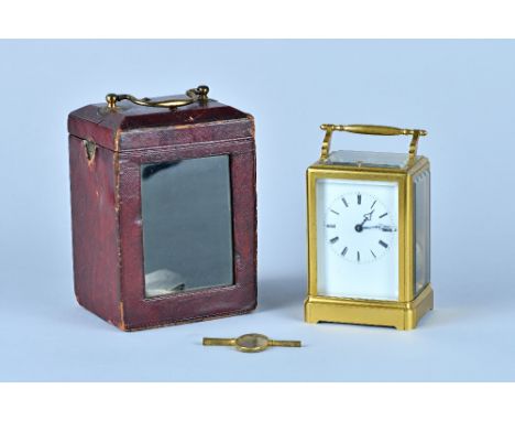 A French gilt brass one-piece case carriage clockBy Grohé, Paris, Circa 1850/60With original gilt platform lever escapement, 