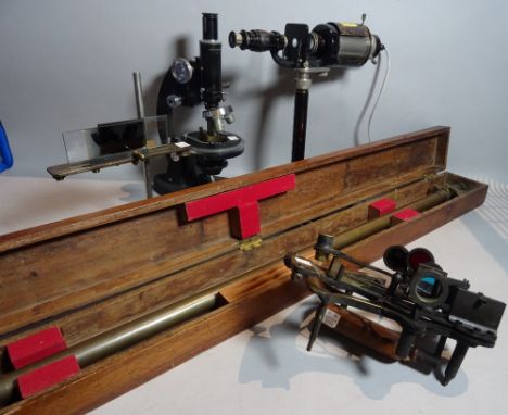 Scientific instruments including 'C. BAKER' an early 20th century microscope, 31cm wide x 32cm high, and another later micros