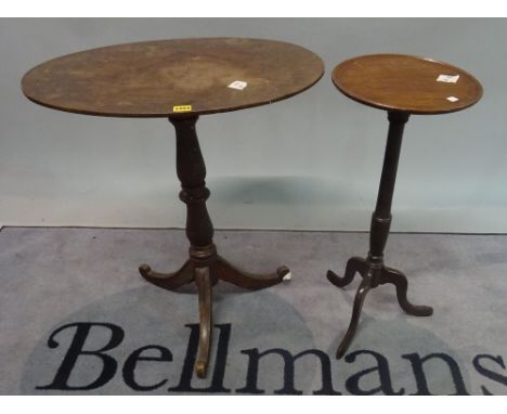 A late George III mahogany tripod table with oval top on turned column three outswept supports, 65cm wide x 73cm high and a G