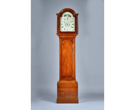 A mahogany Longcase clockEarly 19th centuryThe arched hood with two columns above the trunk door, on plinth base, the 12in ar
