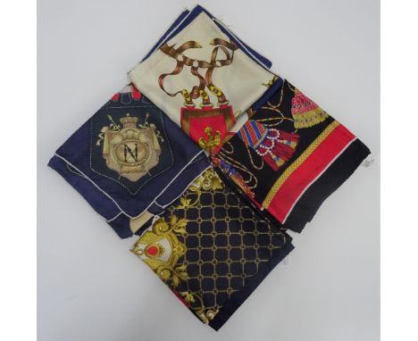 A collection of four Italian printed silk scarves, each designed with mirrored architectural motifs  each approximately 85cm 