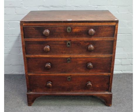 A small George III mahogany chest with four long graduated drawers on bracket feet, 76cm wide x 82cm high.