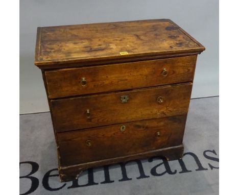 A 19th century elm chest of three long drawers on bracket feet, 72cm wide x 71cm high. 