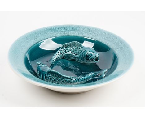 A Poole Pottery blue glazed carp carp dish by Alan White, impressed marks, 214/250, 32.5cm. diameter. Condition Report Good c