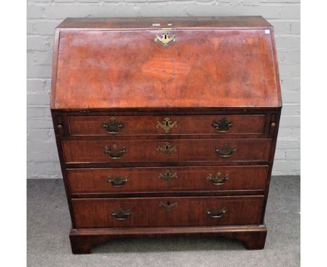 A George II inlaid walnut bureau, the fall over four long graduated drawers on bracket feet, 91cm wide x 102cm high. 